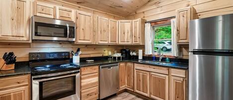 Full kitchen! With space for you to prepare a home cooked meal.