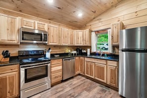 Full kitchen! With space for you to prepare a home cooked meal.