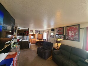 kitchen area is to the right as you come through front door