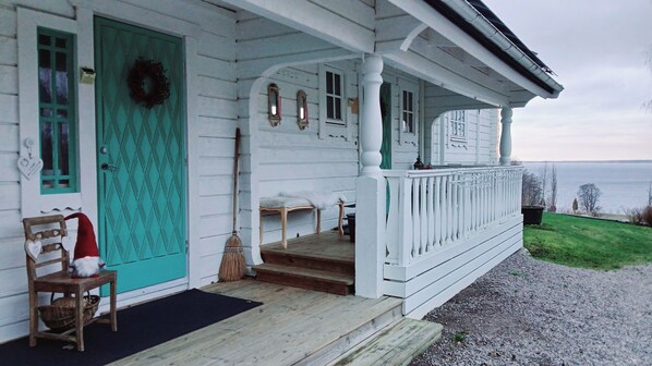 The left green door is the entrance of the Guesthouse Tree of Life.