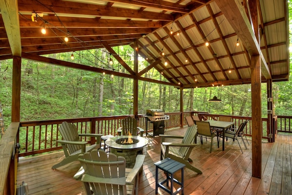 Outdoor Sitting Area with Fire Table, Grill, and Outdoor Eating Space