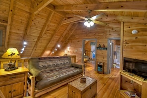 Loft Seating Area with TV and Futon For Additional Sleeping