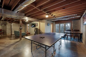 Ping Pong Table, Flat Screen TV, and Additional Dining Area in the Game Room