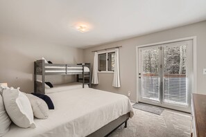 Main Floor Bedroom with Access  to the Ground Level Deck