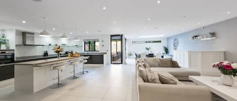 Picture of the open plan living space with kitchen, living and dining area