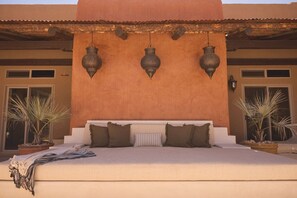 Relax on the built-in day Moroccan daybed.