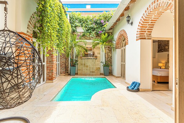 Enjoy the sun at the private pool in the first floor