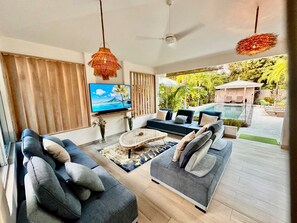 Great Room with 75 Inch TV w/ surround sound