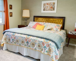 Mid-Century bedroom complete with a view of the beautiful garden through the window!