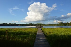 75 foot private dock with a covered sitting area for fishing