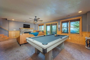 TV and game room with pool table