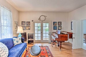 Living Room | 1st Floor | Piano | Stone Fireplace w/ Electric Log
