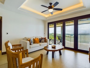 Living area with comfortable sofa, ocean vew