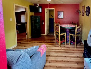Dining area/living room has it's own TV with live stream Netflix and Free channels