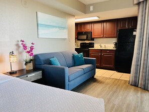 Indulge yourself in the living room with this comfortable sofa and a spectacular view outside.