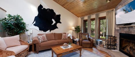 Living Room with Fireplace and Deck