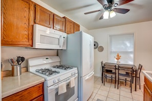 Kitchen and dining area. Dishwasher, large refrigerator, and table for four!