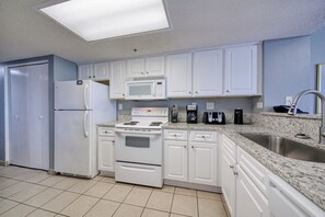 Kitchen Stocked with Amenities to Cook in your Home Away from Home