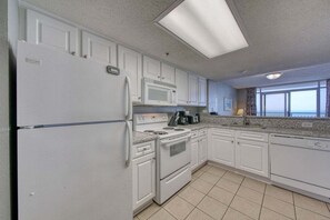 Kitchen with Full Size Appliances and Granite Countertops