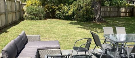 Main Bedroom French doors into private sun drenched garden 