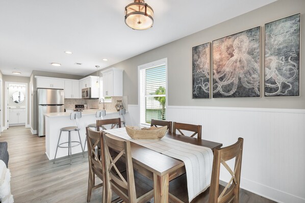 Eat in kitchen and dining area with 6 person dining table.
