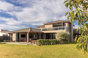 Stunning 6-bed, 3-bath canal home on Lake Hood with private jetty.