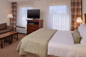 Drift off to sleep in the plush Queen bed.