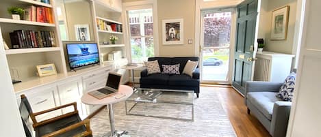 Welcoming front family room & library