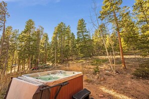 Admire the beautiful forest directly from the comfort of the hot tub.