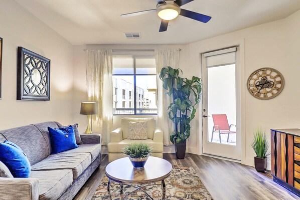 Sit back in the inviting living room with comfortable seating, stylish décor, and a smart TV for streaming your favorites.