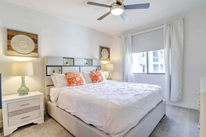 Rest easy in a tranquil bedroom featuring a plush bed, soft linens, and blackout curtains for a great night’s sleep.