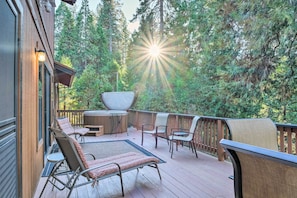 Huge private deck overlooking the big trees in the backyard
