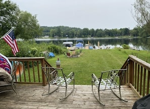 Deck that overlooks the lake and private beach area 