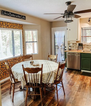 Wood round feature wall in the kitchen. 