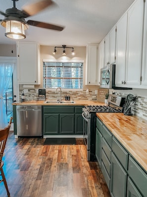 Newly renovated kitchen with stainless steel appliances.