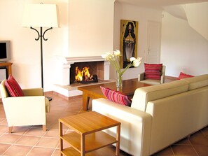 Kick back your feet and relax in the cozy living area.