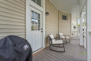 Back Private Furnished Porch with comfortable seating and charcoal grill