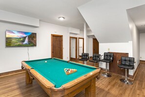 Pool Table and TV in the Lower Level