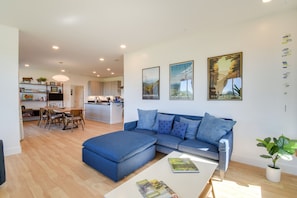 Living Room with open space view of Kitchen and Dining areas