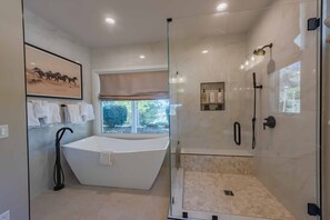 Master bathroom with large soak tub and shower