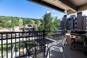 A brand-new Weber gas grill and patio furniture are the perfect way to enjoy a meal outside while gazing at the ski resort.  Epic views!