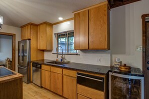 Remodeled Kitchen has nice appliances, warming drawer and wine refrigerator  