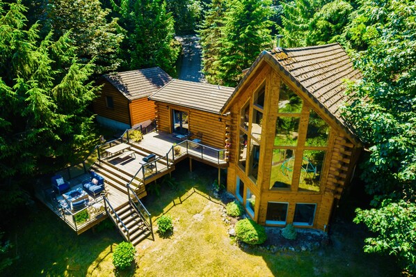 Luxury riverfront log home on one acre