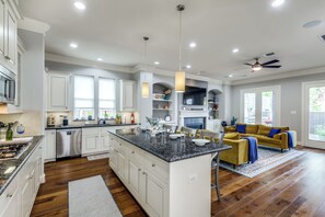 You will love our open concept kitchen and living room with Island.