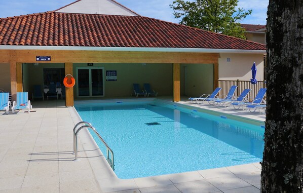 Enjoy the lovely seasonal outdoor pool.