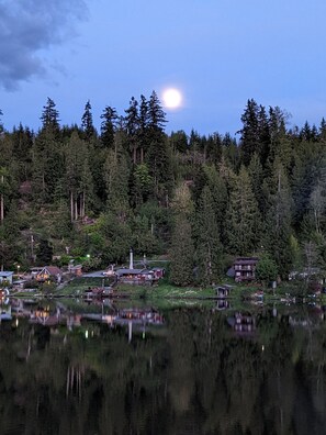The moon rises on the other side of Ohop Lake.