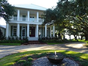 With the home nestled under the Oaks