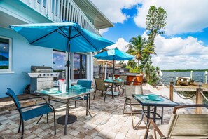 Communal back patio on the bay.....enjoy the views! No hot tub