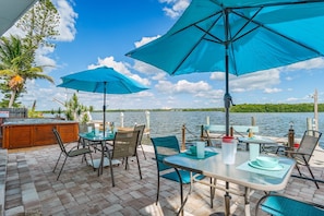 Open, shared patio with community tables for all guests to enjoy. No hot tub