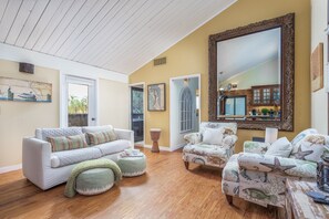 Second floor fabulous condo in  Sandy Cove.  Sleeps 4 with a queen sofa bed, round coffee table was added.